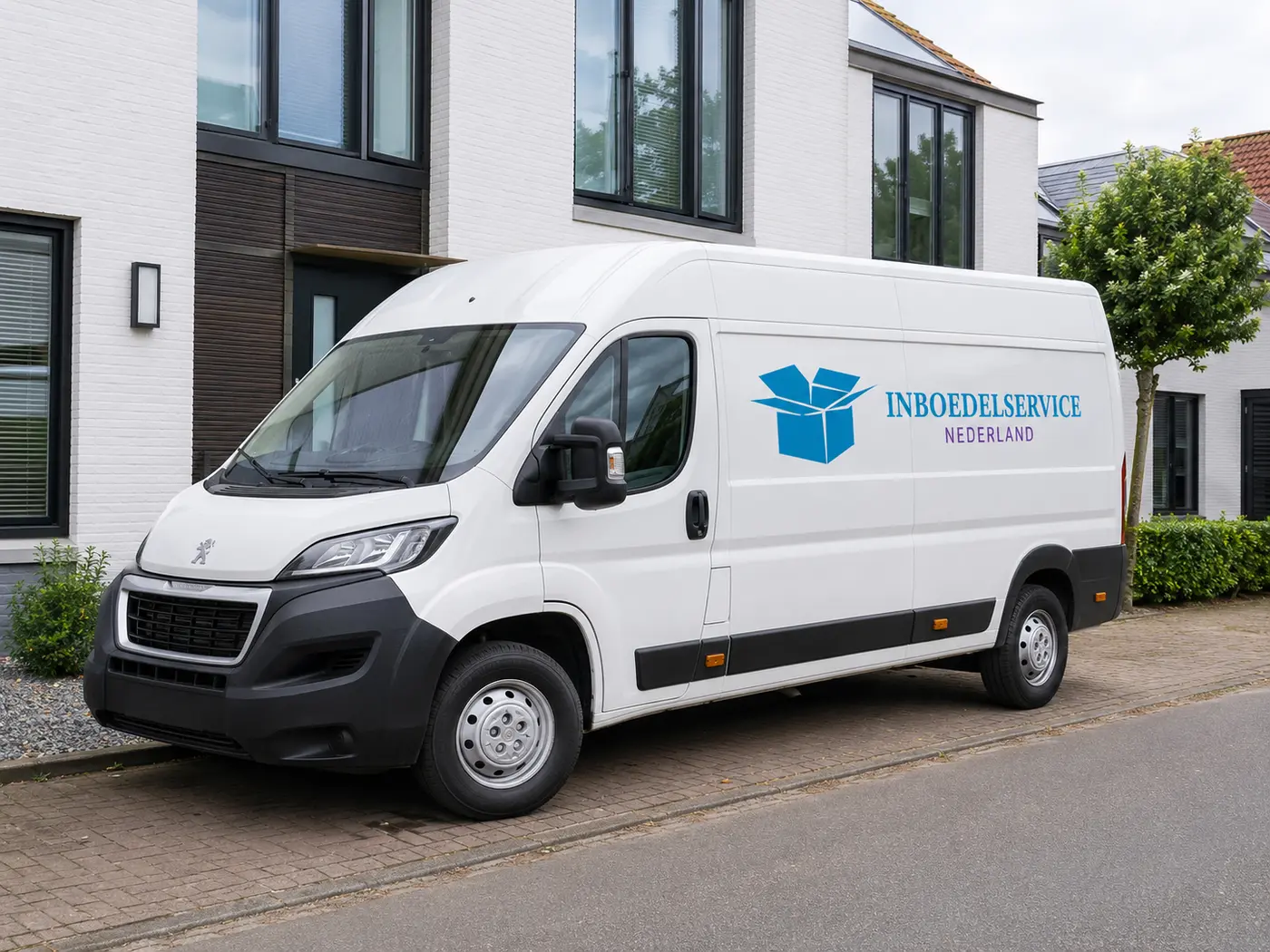 Witte Peugeot Boxer bedrijfsbus van Inboedelservice Nederland
